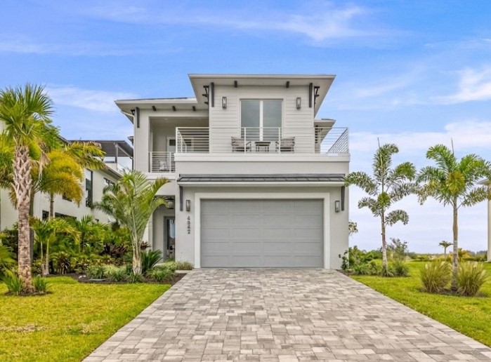 Front view of exclusive beautiful 2-story Vero Beach home for sale.